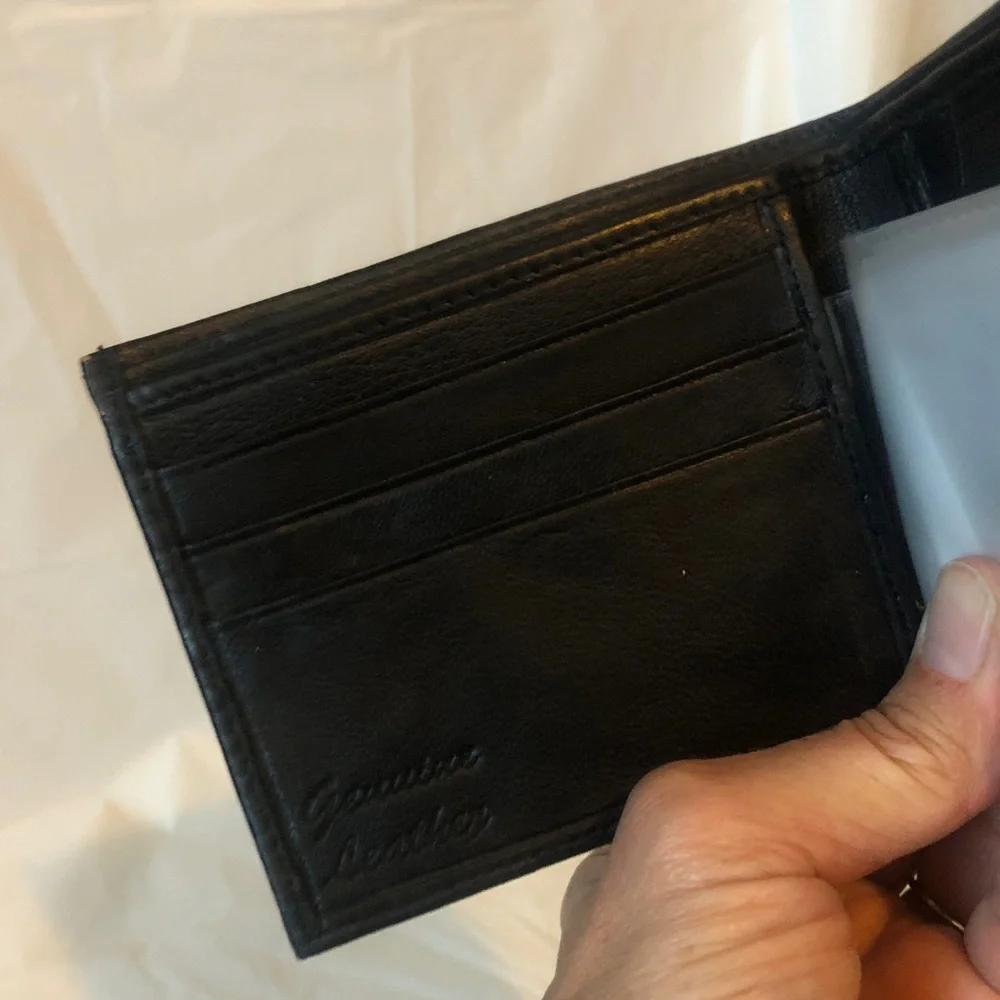 Buttery black leather men’s wallet with zip billfold compartment; new & quality